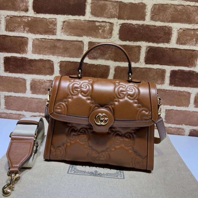 G*u*i top handle bags